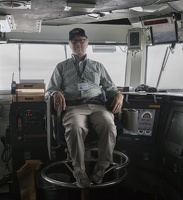 403-6087 USS Reagan - Richard in Captain's Chair